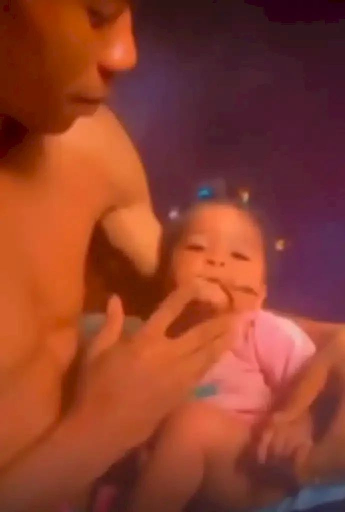 Shock as mother records while father feeds their baby with weed (Video)