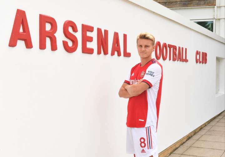 Martin Odegaard completes £34m switch from Real Madrid to Arsenal as Norway ace signs five-year deal at Emirates - but LaLiga club have first refusal if club sell him