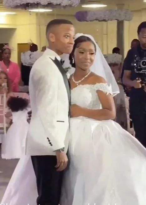 Mixed reactions as video of 21-year-old couple at their wedding trends (Watch)