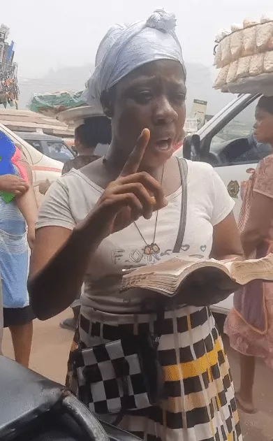 'I don't have any excuse' - Lady who can't speak stuns many as she is spotted preaching, winning souls on street