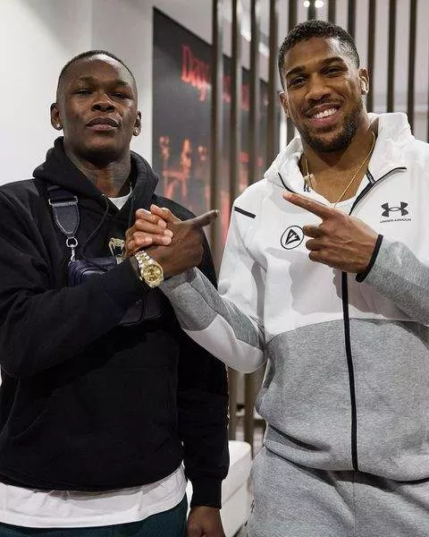 At the Otto Wallin weigh-in, Israel Adesanya's endorsement of Anthony Joshua's camp symbolized a moment of solidarity in the sports community.