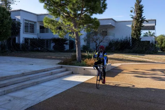  Cyclist Bassel Soufi visits the summer resort of ousted Bashar al-Assad as he tours a part of his daily training in Burj Islam near Latakia, Syria, December 13, 2024.  (credit: REUTERS/UMIT BEKTAS)