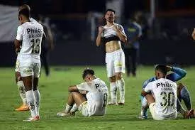 Santos FC players dejected after relegation -- Image credit: The Vanguard