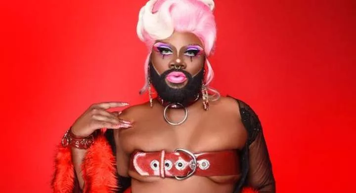 A drag queen who identifies as a transgender [Pinterest]