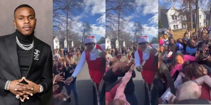 DaBaby dresses up like Santa Claus to share money to residents