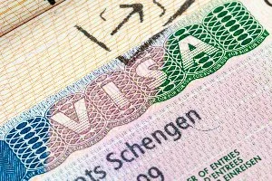 A passport with a schengen visa