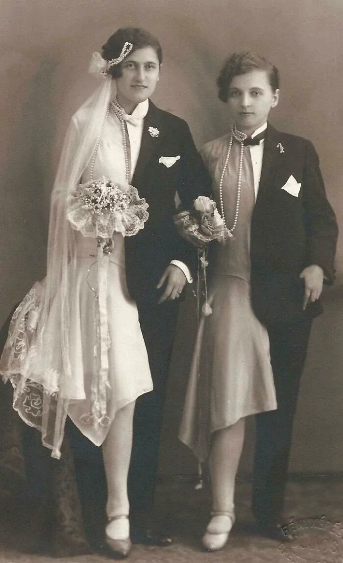 Atelier Photo: 'A Lesbian Couple In Semi Drag Wedding Attire