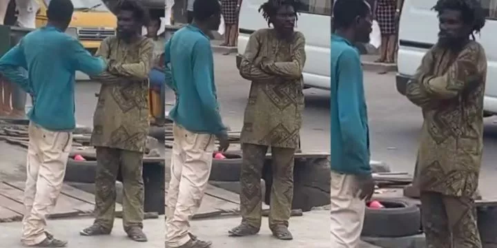 Moment two mentally challenged men were spotted conversing on a busy street