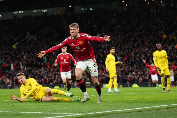 Rasmus Hojlund of Manchester United celebrates after he scores their third goal during the UEFA Europa League 2024/25 League Phase MD5 match betwee...