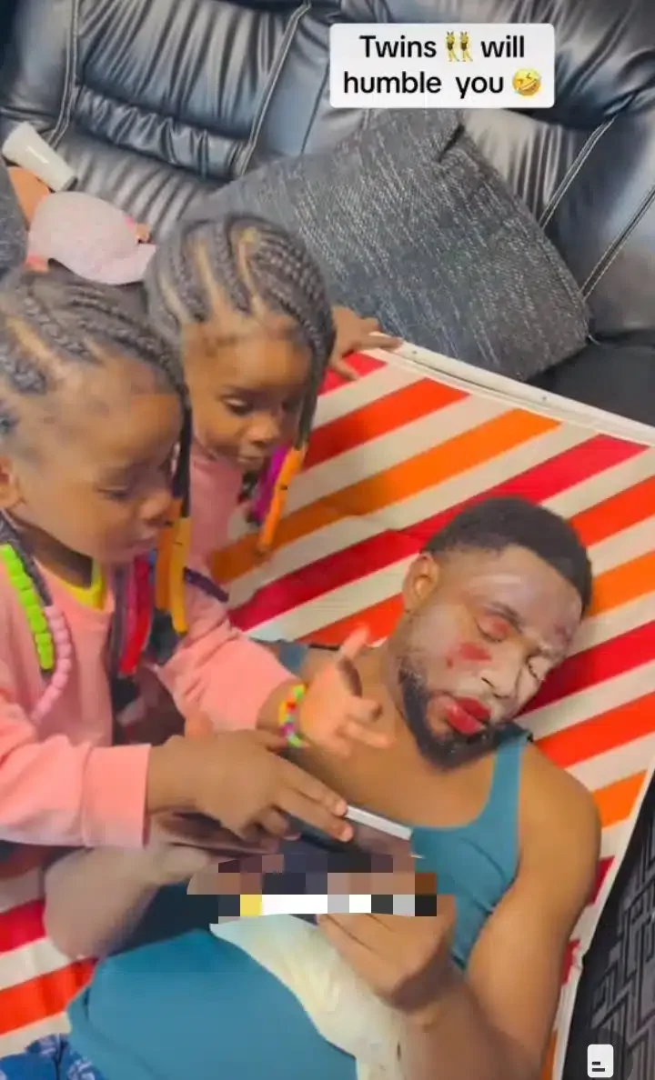 'You did a very good job' - Dad lauds twin daughters as they practice their make up skills on him