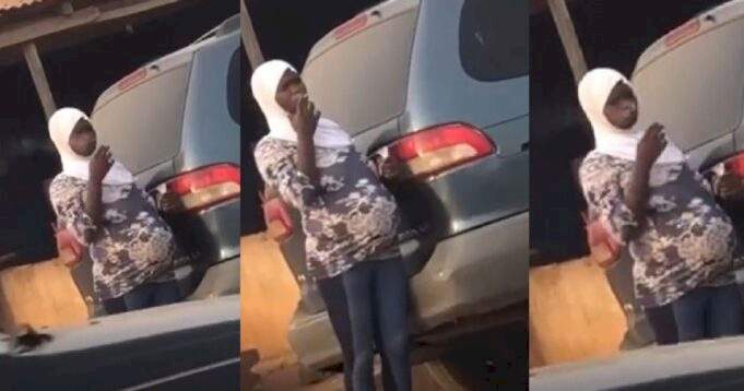 Heavily pregnant woman draws criticism after being spotted smoking by the roadside (video)