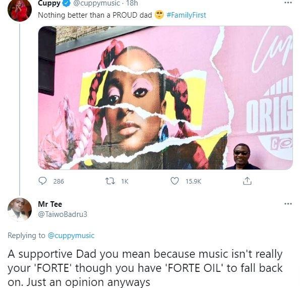 'Nothing better than a proud dad' - Reactions as Femi Otedola pose beside DJ Cuppy's billboard