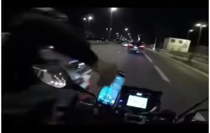 'Let the poor breathe' - Moment man on power bike swiftly steals phone from man on a moving Okada (Video)