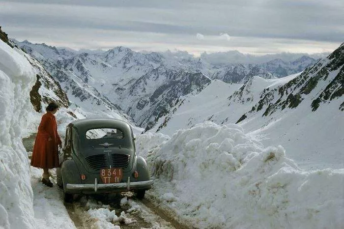 A Woman Overlooking A Snowy Mountain Pass In The Pyrenees Mountains, France - 1956