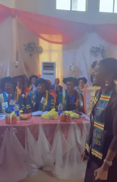 Moment lady walks majestically as she is announced as the best graduating student in school