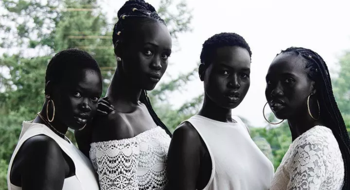 The South Sudanese, particularly the Dinka and Nuer ethnic groups, are known for their exceptionally deep, dark complexions