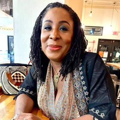 American professor, Uju Anya calls out Nigerian tailor for scamming her of $400 for wedding dress