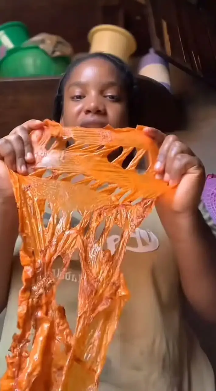 Lady shocked as kilishi turns out to be rubber coated with pepper