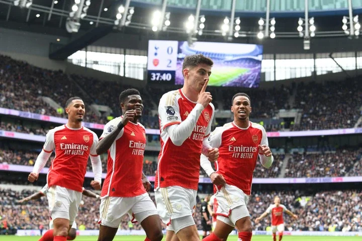 Kai Havertz celebrates scoring his team's third goal with William Saliba, Thomas Partey and Gabriel of Arsenal during the Premier League match betw...