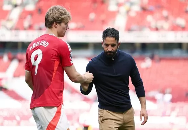 Manchester United head coach Ruben Amorim embraces Rasmus Hojlund after the defeat to West Ham United.