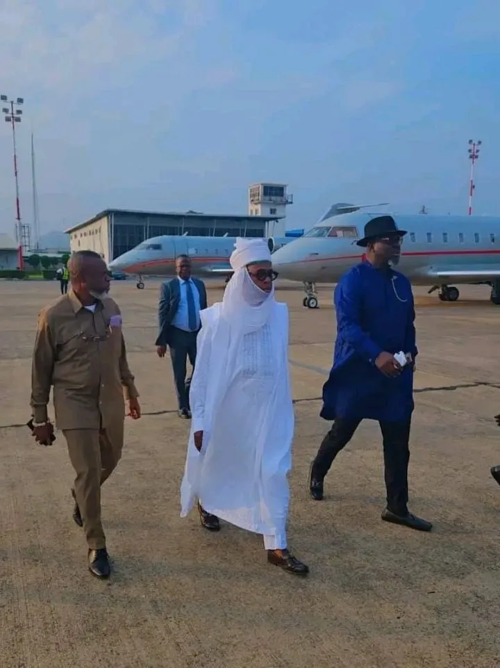 Former Minister of Transport, Rotimi Amaechi, adorns Northern attire to Buhari