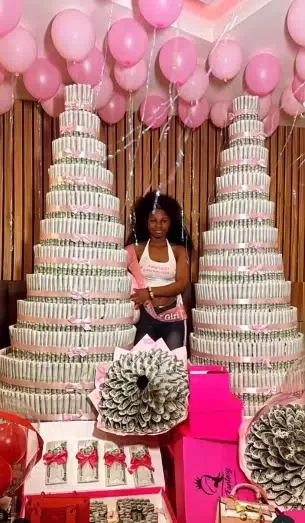 'For this economy' - Lady shows off gigantic money cakes, shoes, bags, other gifts from boyfriend for her birthday