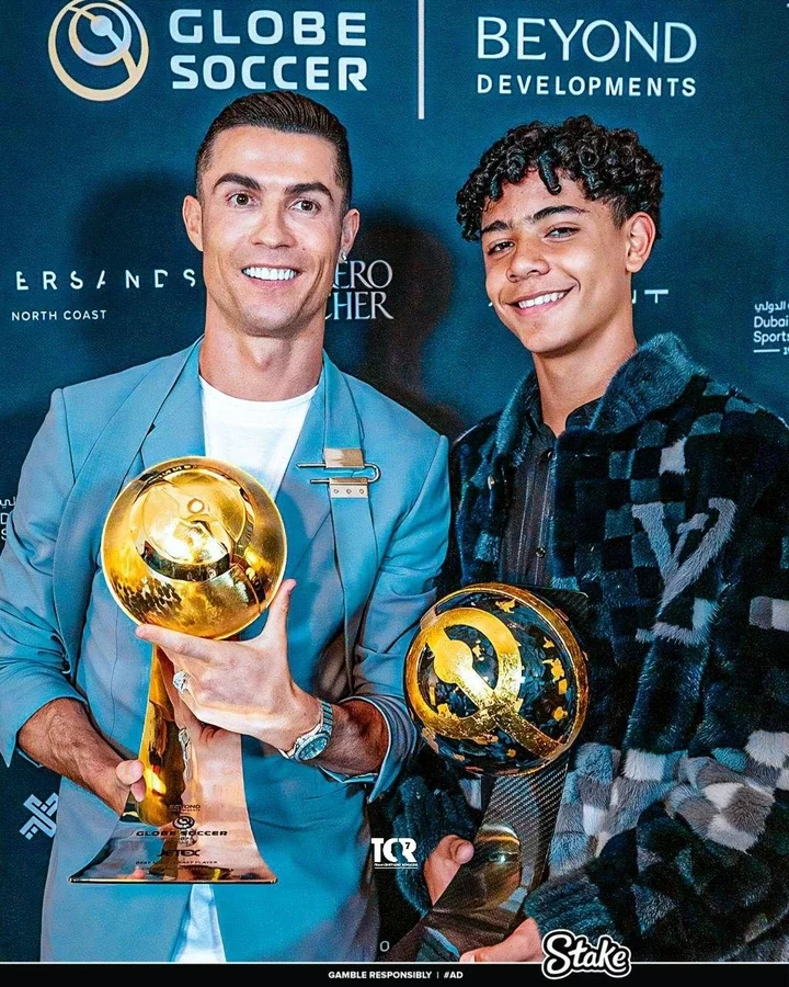 Reactions as Cristiano Ronaldo's son was spotted congratulating him after winning a globe soccer award