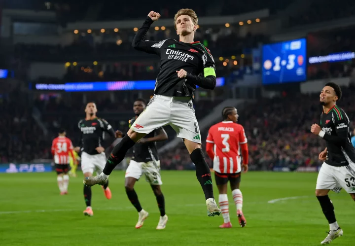 Martin Ødegaard of Arsenal celebrating a goal.