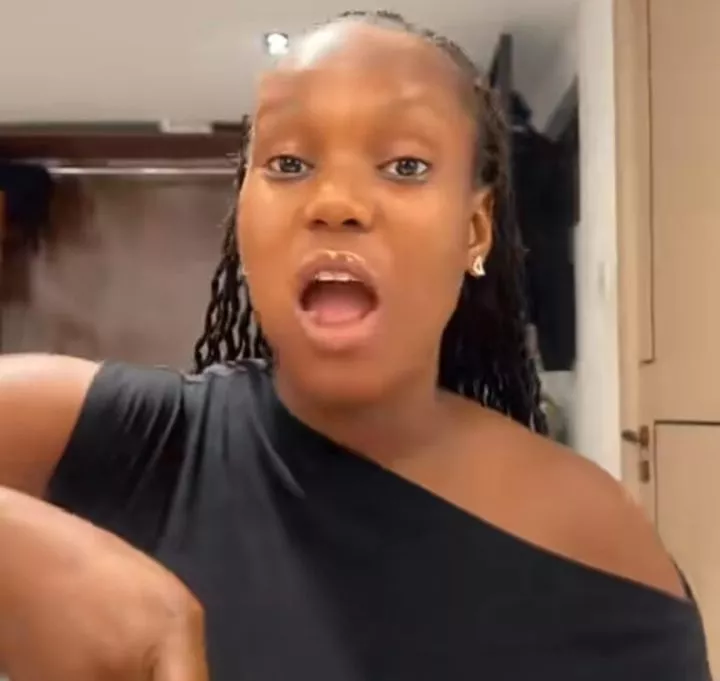 Lady shocks internet as she eats hot eba with ice cream