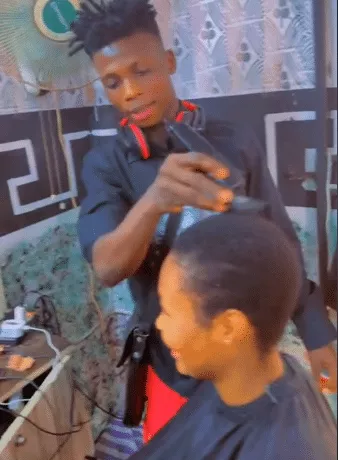 'Them say attachment na N5500 now' - Boyfriend shaves off girlfriend's hair in his salon