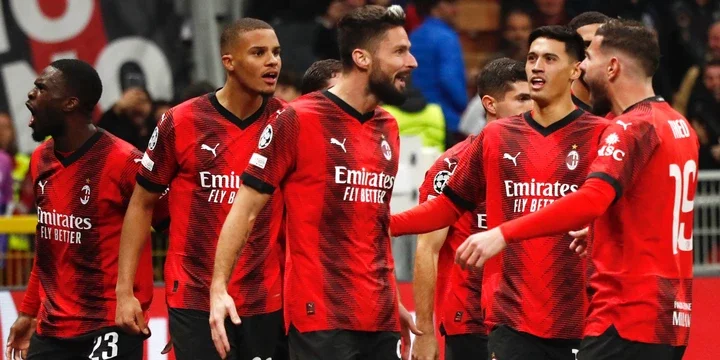 AC Milan players celebrating in the Champions League