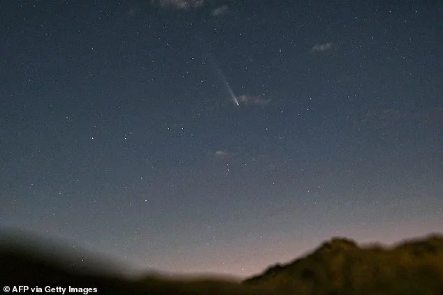 The star of Bethlehem could have been a comet recorded by Chinese astronomers in 5BC which reported lingered in the sky for 70 days. Pictured: a comet appears over Lebanon in 2024