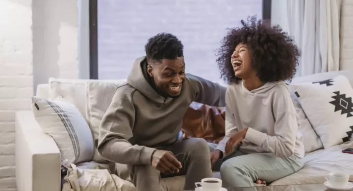 A couple laughing