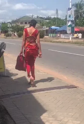 'Is she normal?' - Video of lady with strange walking style on the road causes buzz online