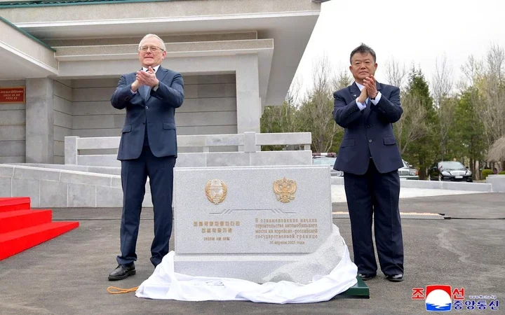 Alexander Matsegora, the Russian Ambassador to North Korea attends the ceremony alongside Kim Kyong Jun, North Korea's Land and Environment Protection Minister