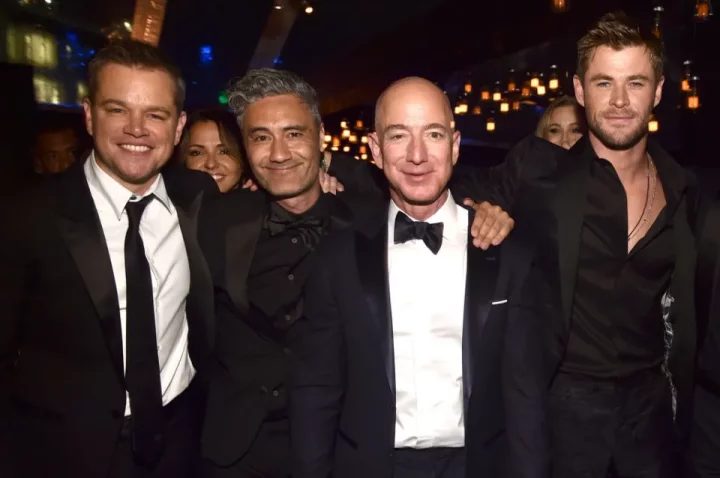 The event is sure to be celeb-packed, as Bezos and then wife Mackenzie were pictured with Matt Damon, Taika Waititi, and Chris Hemsworth at Amazon's 2018 Globes party