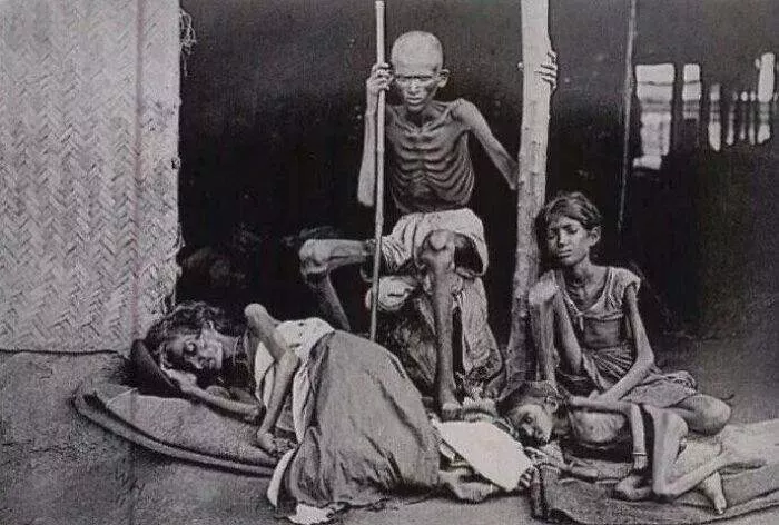 A Man Guards His Family From The Cannibals During The Madras Famine Of 1877 At The Time Of British Raj, India