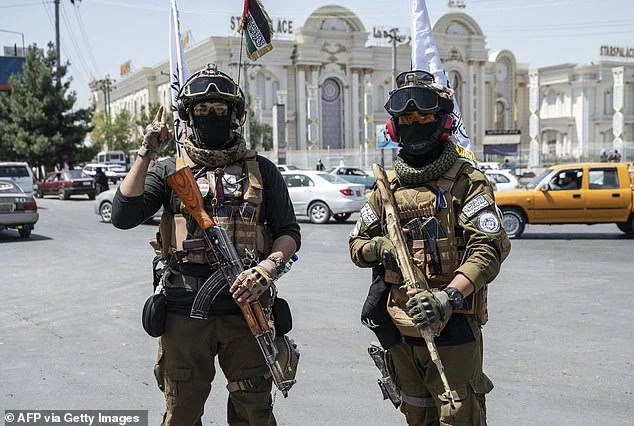 Pictured: Taliban security personnel stand guard along a road on the eve of the third anniversary of Taliban takeover of Afghanistan, in Kabul on August 13, 2024