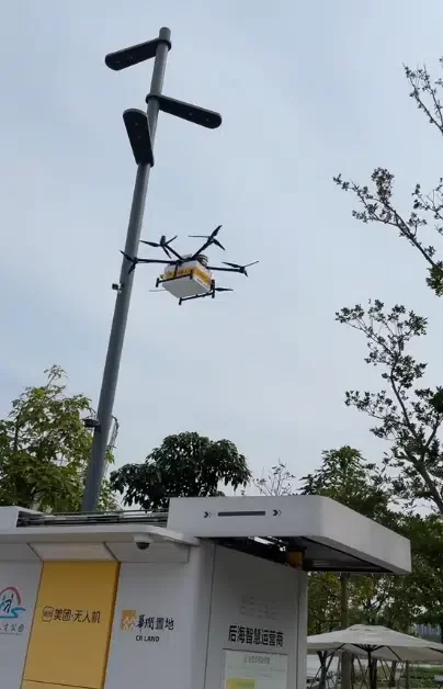 Man in shock as drone delivers drink to him at a park