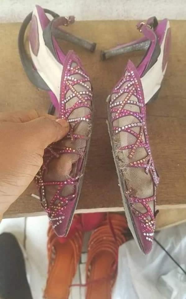 Lady laments after receiving horrible pair of shoes as giveaway gift