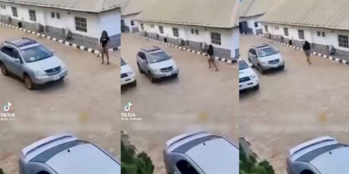 "Give me my money" - 'Businesswoman' demands as she pursues her client's car at a hotel to stop him from leaving (video)