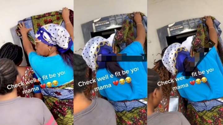 African mum spotted covering an ATM with her wrapper while her daughter makes withdrawal (Video)