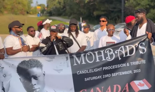 Bella Shmurda and other Nigerians hold candlelight procession for late Mohbad in Canada (video)
