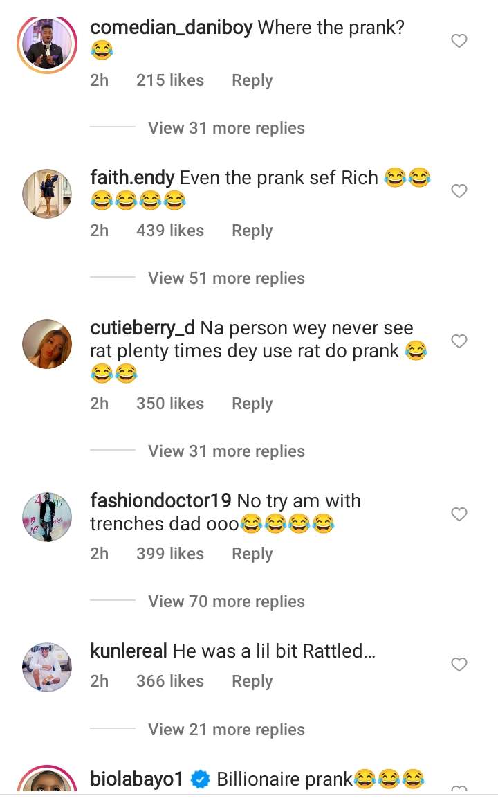 'No try am with trenches dad' - Reactions as DJ cuppy pranks her dad, Femi Otedola with a fake rat (Video)