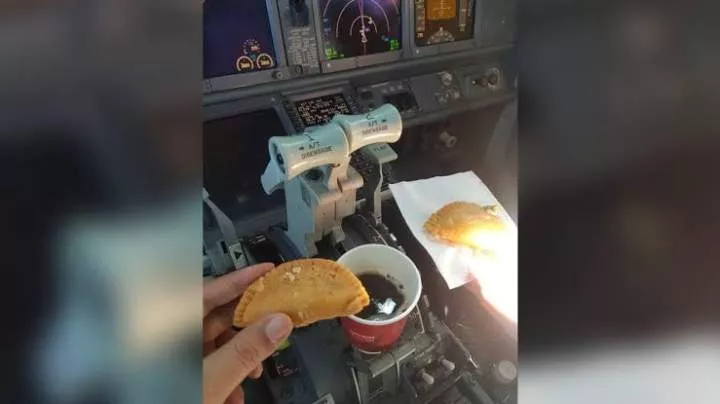 Pilots suspended after photos showed them taking hot coffee and pastries in the cockpit