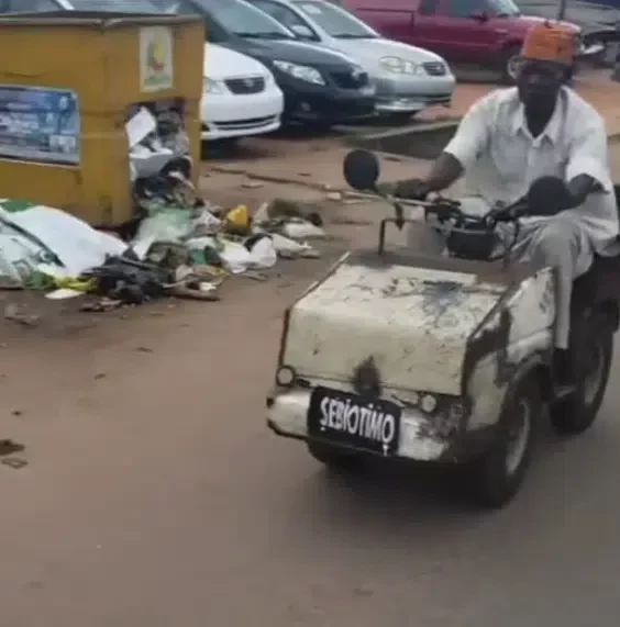 Nigerian man makes others grin with envy as he takes his little motor car 'sebotimo' to the streets (Video)