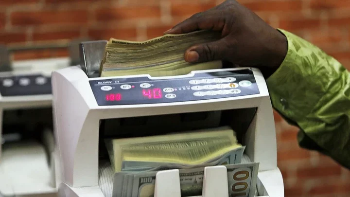 Naira gains about 15% as dealers dump dollar, count losses