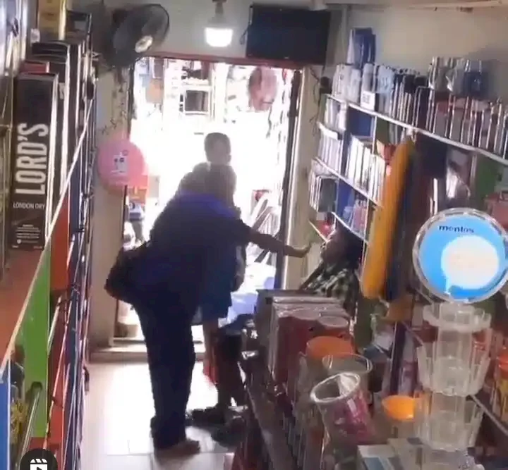 Moment vendor falls unconscious and robbed after she was sprayed unknown substance (Video)