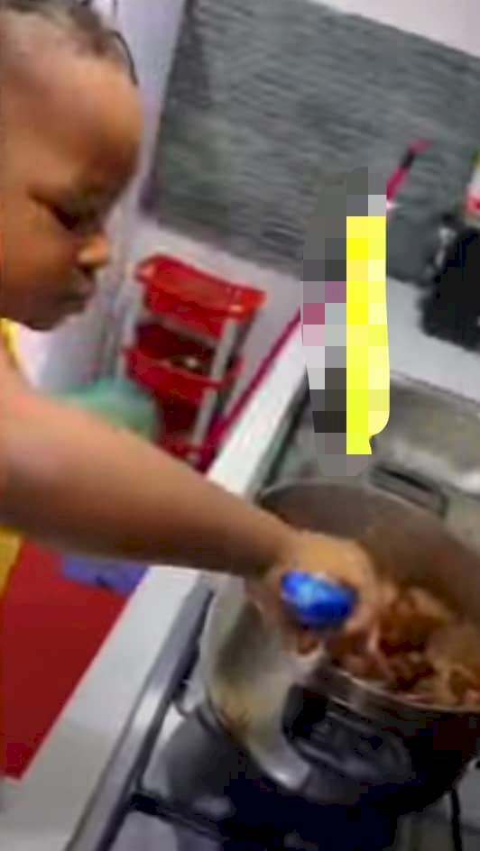 'Catch them young' - Little boy stuns netizens with amazing cooking skills as he's filmed preparing Jollof rice, okra soup for his family (Video)