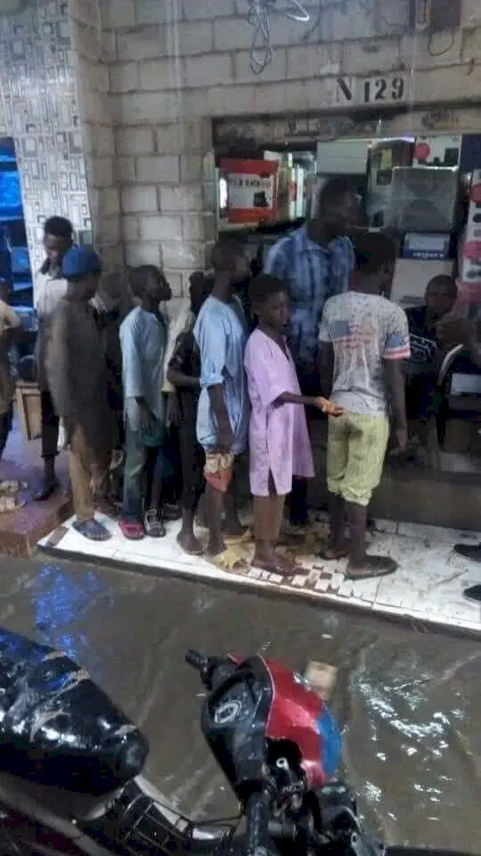 Generous Igbo businessman gathers 30 almajiri kids to give them new clothes